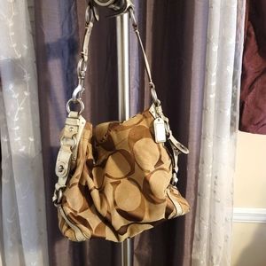 Imperfect coach purse  Tanish